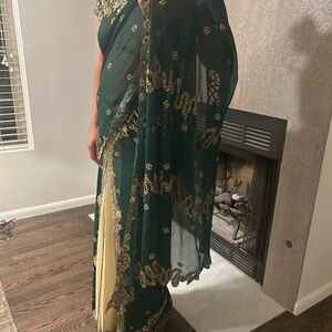 Sari/ saree bottle green & Beige Embroidered and stitched saree with cutwork.